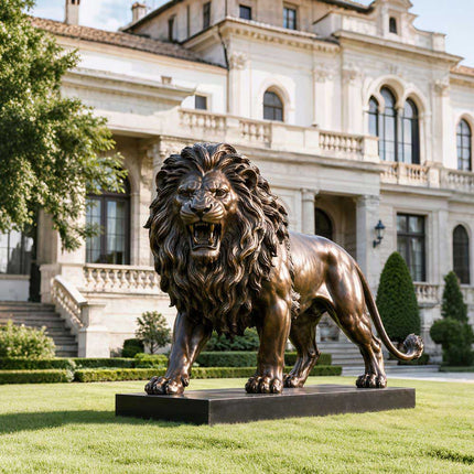 Large bronze lion statue displayed on the lawn of a formal estate