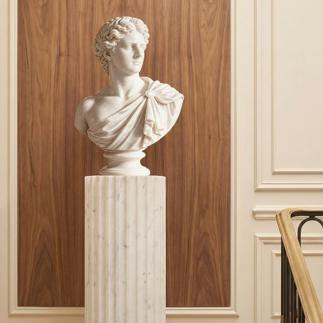 Marble bust sculpture displayed in a refined luxury interior space