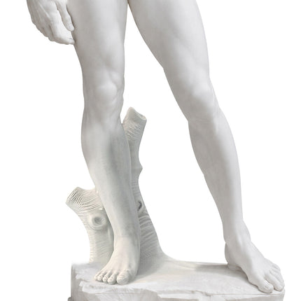 Close-up of a marble David statue showing its legs, supporting tree trunk, feet, and integrated rectangular base