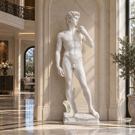 White marble David statue displayed beside a stone wall in an elegant private residential interior