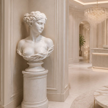 Neoclassical marble bust sculpture placed in an architectural interior