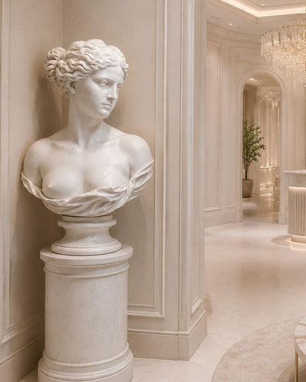 Neoclassical marble bust sculpture placed in an architectural interior