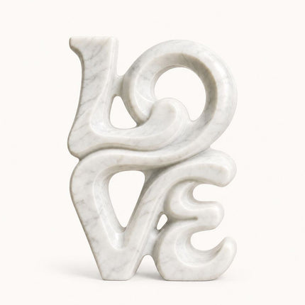 White marble sculpture with an abstract LOVE form and rounded open composition