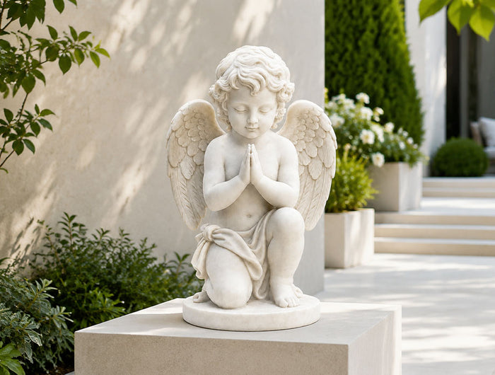 White marble stone sculpture displayed in a luxury outdoor garden setting