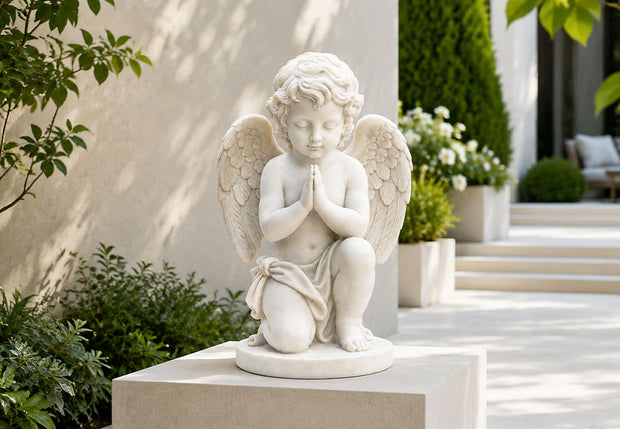 White marble stone sculpture displayed in a luxury outdoor garden setting