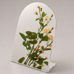 Mirror polished stainless steel finish with a highly reflective chrome-like surface