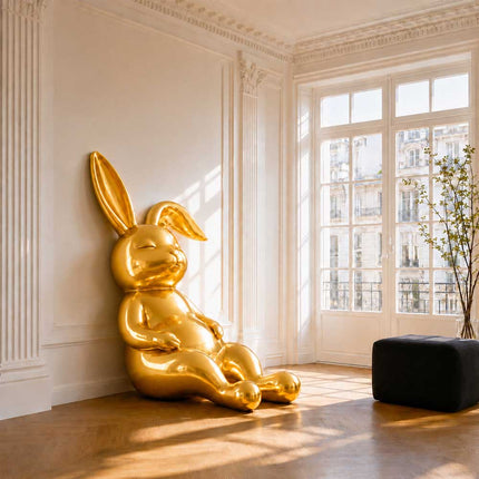 Contemporary rabbit animal sculpture placed in an elegant architectural interior