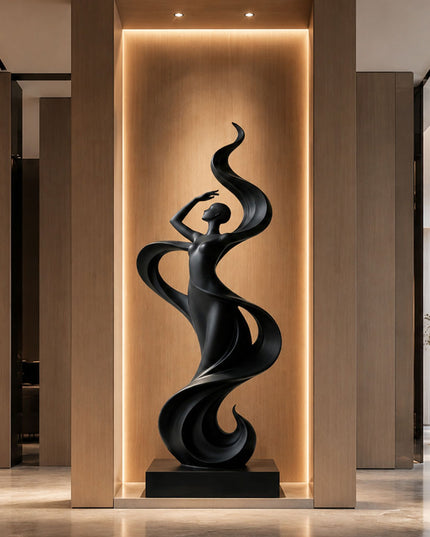 Modern black stainless steel sculpture installed in a contemporary architectural interior