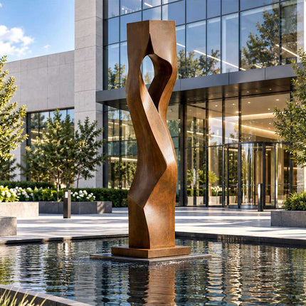 Modern outdoor Corten steel sculpture beside an architectural water feature