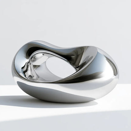 Mirror polished organic stainless steel sculpture with a broad central opening