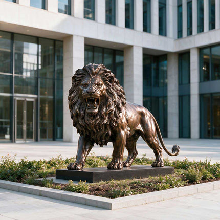 Bronze lion statue displayed outside a modern building entrance