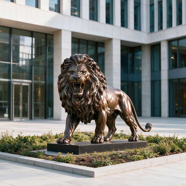 Bronze lion statue displayed outside a modern building entrance