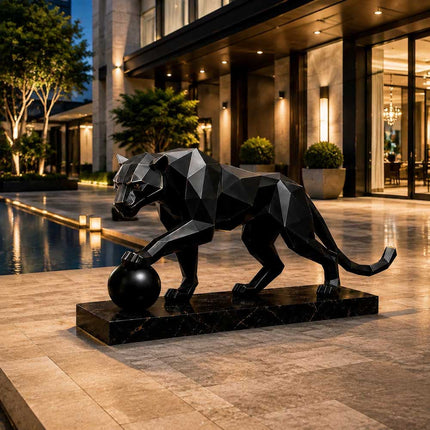 Panther sculpture displayed in a modern luxury architectural environment