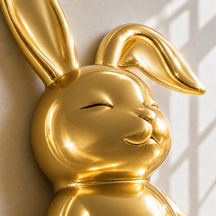Detailed view of handcrafted stainless steel rabbit sculpture with reflective finish