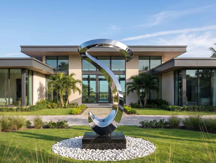 Modern abstract sculpture displayed in a luxury architectural outdoor space