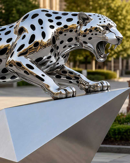Detailed mirror polished stainless steel leopard head sculpture with refined contours
