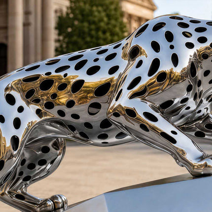 Mirror polished surface details of a contemporary stainless steel animal sculpture