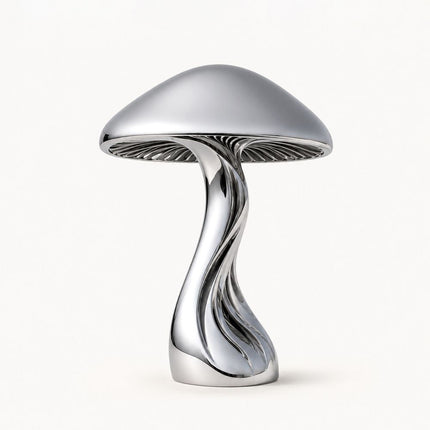 Mirror polished stainless steel mushroom sculpture with a rounded cap and twisting openwork stem on a white background