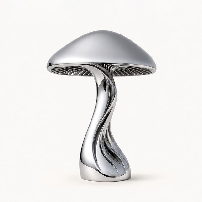 Mirror polished stainless steel mushroom sculpture with a rounded cap and twisting openwork stem on a white background