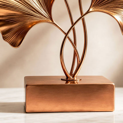Detail of the integrated stainless steel base and handcrafted sculpture connection