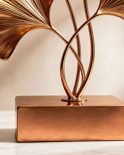 Detail of the integrated stainless steel base and handcrafted sculpture connection