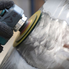 Rough grinding stainless steel sculpture to remove welding marks and refine shape