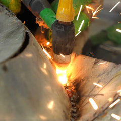 Close-up of welding seams ensuring structural integrity of stainless steel sculpture