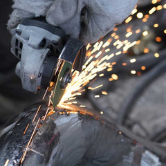Structural trimming of stainless steel sculpture after assembly to refine final form