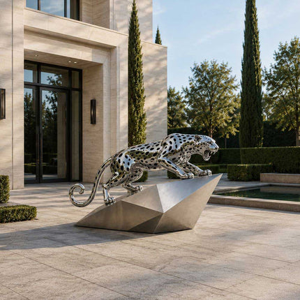 Contemporary leopard sculpture installed in a modern estate garden landscape