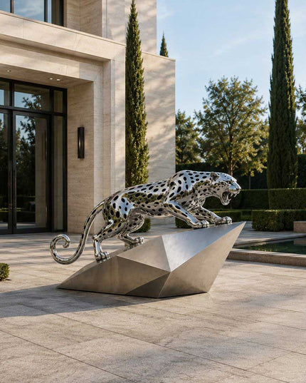 Contemporary leopard sculpture installed in a modern estate garden landscape